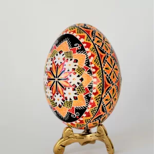 Pysanka Ukrainian Easter egg orange red black color starburst pattern